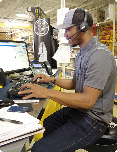 Team member at Plimpton and Hills workstation